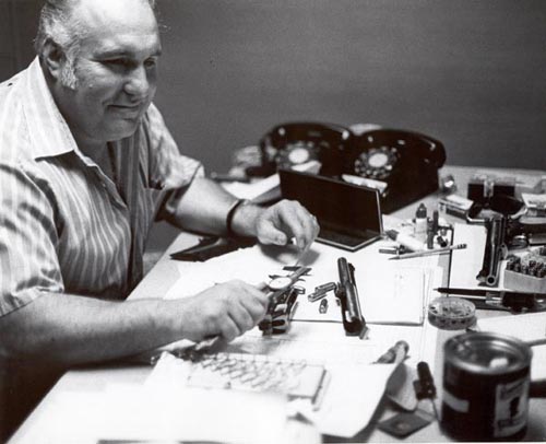 Harry Sanford at desk